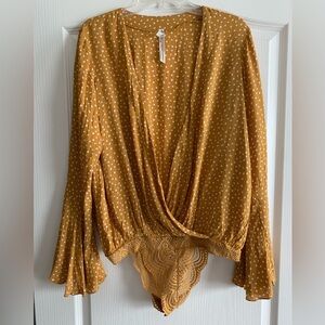 FREE PEOPLE mustard yellow bell sleeve bodysuit size Medium